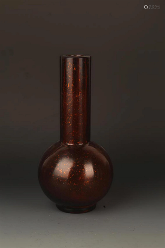 A FINE AMBER COLOR GLASS MADE LONG NECK BOTTLE