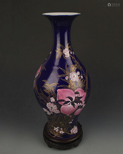 A DARK BLUE GLAZED FAMILLE ROSE OLIVE STYLE VASE