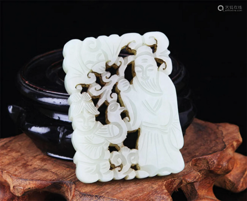 A FINE PALE CELADON JADE IN FIGURE OF CHARACTER