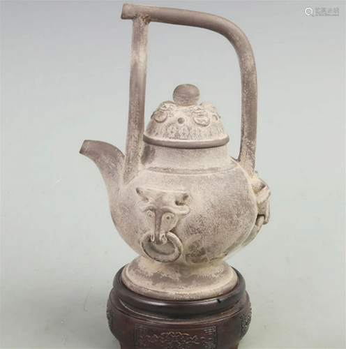 A FINE ZISHA TEAPOT WITH HIGH HANDLE