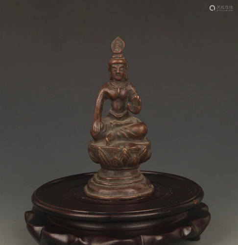 A FINELY CARVED SMALL BRONZE GUAN YIN FIGURE