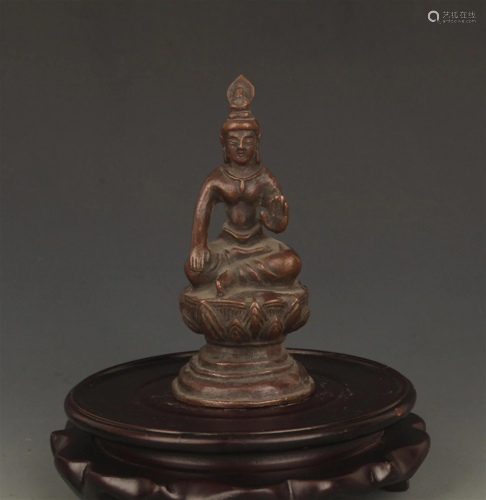 A FINELY CARVED SMALL BRONZE GUAN YIN FIGURE