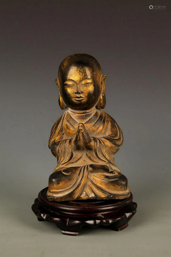 A FINELY CARVED YONG BUDDHA BRONZE FIGURE