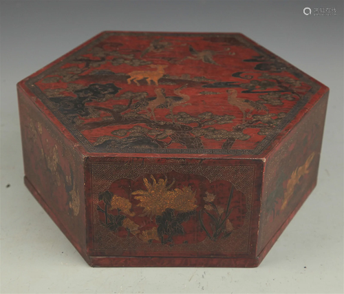 A GILT LACQUER FLOWER PAINTED HEXAGONAL BOX