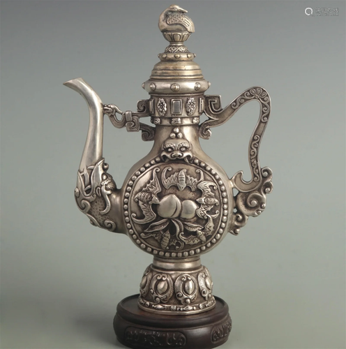 A FINE WHITE BRONZE TIBETAN BUDDHISM BRONZE EWER