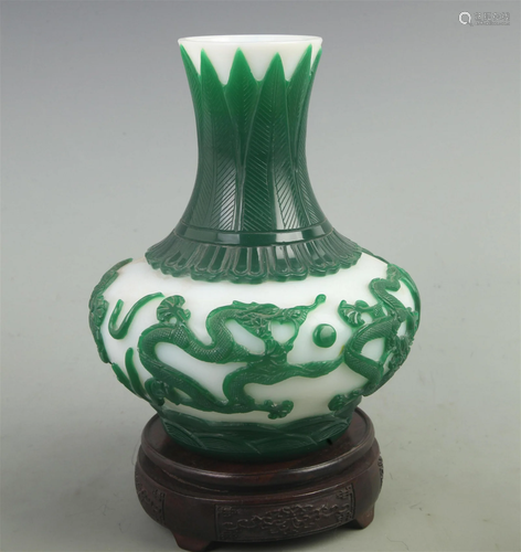 A FINE GLASS MADE FINELY CARVED VASE