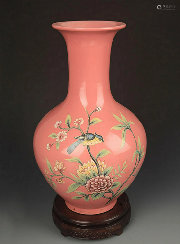 A CARMINE RED FAMILLE ROSE FLOWER AND BIRD VASE