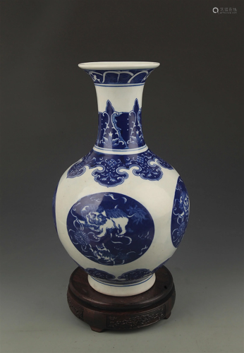 BLUE AND WHITE LONG PLAYING PATTERN VASE