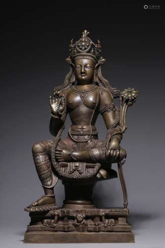 A bronze and silver green Tara sitting statue in qing Dynast...