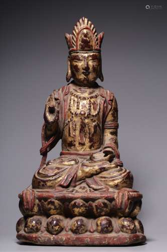 A sitting statue of golden Guanyin in wood lacquer, Qing Dyn...