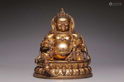 Qing Dynasty, bronze gilt inlaid tourmaline huang God of wea...