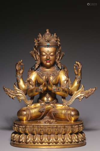 Qing Dynasty, bronze gilt inlaid treasure four-arm seated gu...