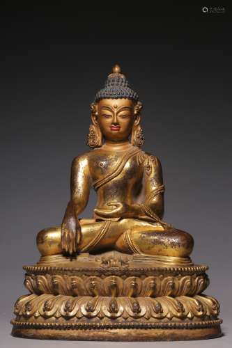 Sitting statue of Sakyamuni with bronze gilt in Qing Dynasty