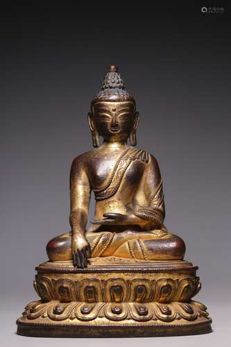 Sitting statue of Sakyamuni with bronze gilt in Qing Dynasty