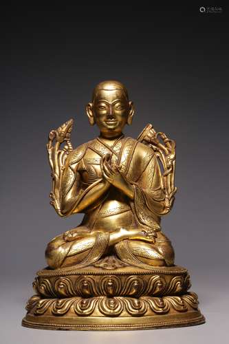 Qing Dynasty, bronze gilt master sitting statue