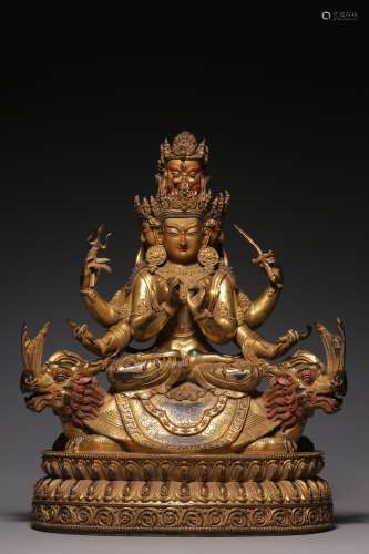 Qing Dynasty, bronze gilt six arm sitting statue of Avalokit...