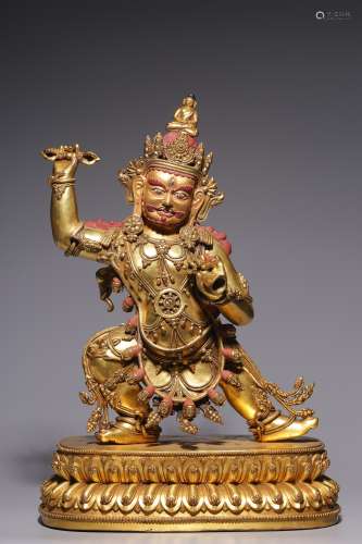 A bronze gilt bodhisattva stands upright in qing Dynasty