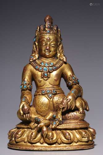 Qing Dynasty, bronze gilt yellow god of wealth sitting statu...