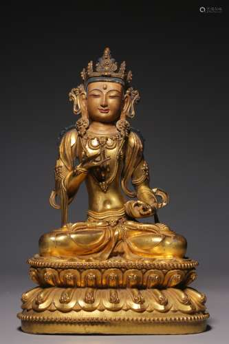 Qing Dynasty, bronze gilt jinsa hammer sitting statue