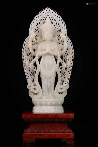 A white jade eight-arm Guanyin standing statue in Hetian, Qi...