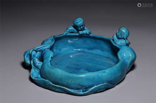 In qing Dynasty, the blue glaze boy wishes the birthday to w...