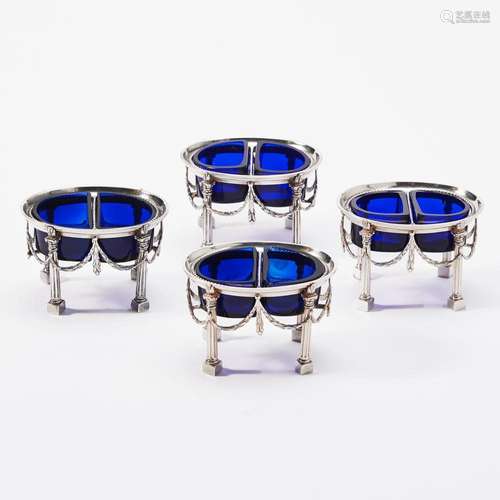 A SET OF FOUR DUTCH SILVER SALTS AND BLUE GLASS LINERS MARK ...