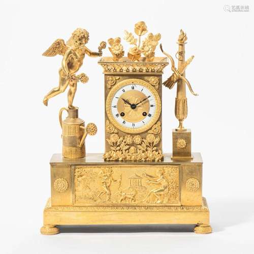 A FRENCH EMPIRE ORMOLU MANTEL CLOCK CIRCA 1820