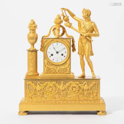 A FRENCH EMPIRE ORMOLU MANTEL CLOCK CIRCA 1820