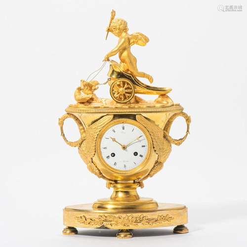 AN EMPIRE ORMOLU MANTEL CLOCK CIRCA 1810