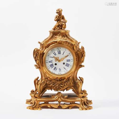 A FRENCH GILT-BRONZE TRANSITION-STYLE MANTEL CLOCK LATE 19TH...