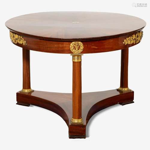 AN EMPIRE ORMOLU-MOUNTED MAHOGANY CENTRE TABLE FIRST QUARTER...