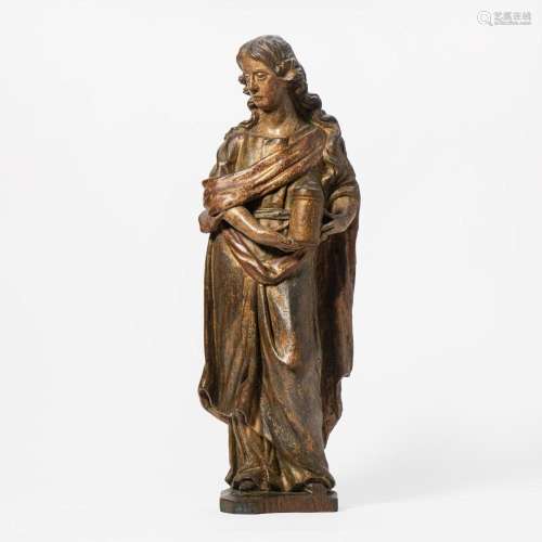 A PARCEL GILT AND POLYCHROMED CARVED OAK FIGURE OF MARY MAGD...