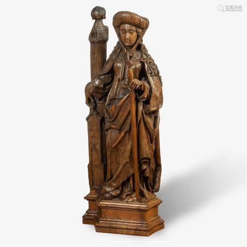 AN OAK FIGURE OF ST. BARBARA PROBABLY BRABANT, CIRCA 1500