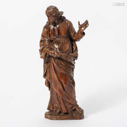 A BOXWOOD SCULPTURE OF SAINT JOHN PROBABLY ITALIAN, CIRCA 17...