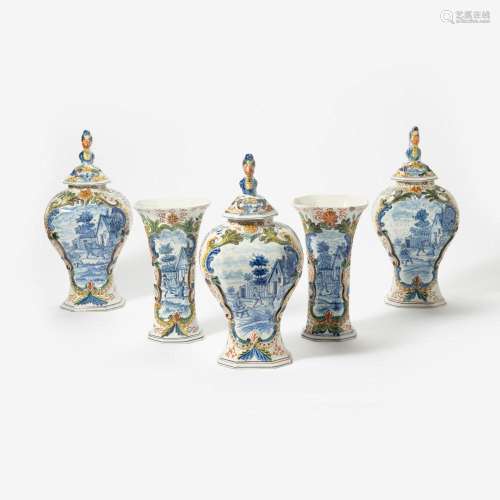 A DUTCH DELFT FIVE-PART BLUE AND WHITE AND POLYCHROME GARNIT...