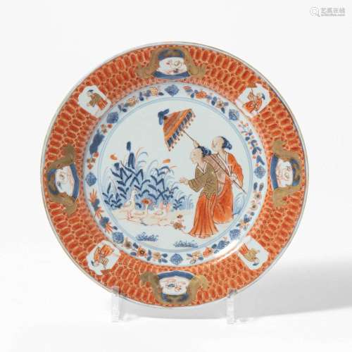 A CHINESE IMARI 'DAME AU PARASOL' PLATE AFTER A DESI...