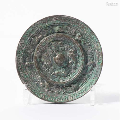 A CHINESE BRONZE MIRROR TANG DYNASTY (618-907)