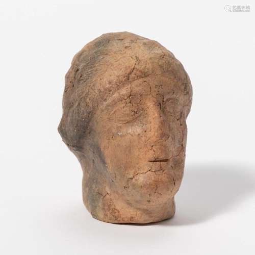 A TERRACOTTA HEAD OF A YOUTH PROBABLY SOUTHERN ITALY, 5TH-4T...