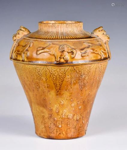 A Molded Yellow-Glazed Jar