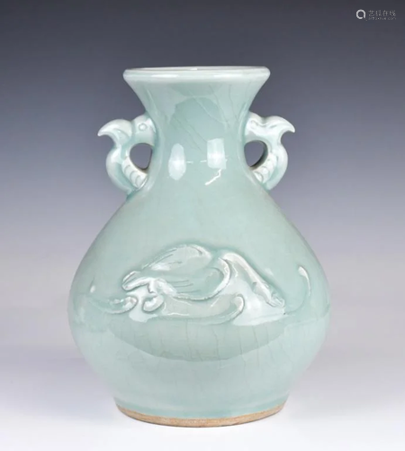 A Carved Celadon-Glazed Vase