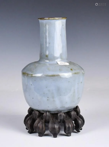 A Blue-Glazed Bottle Vase With Stand