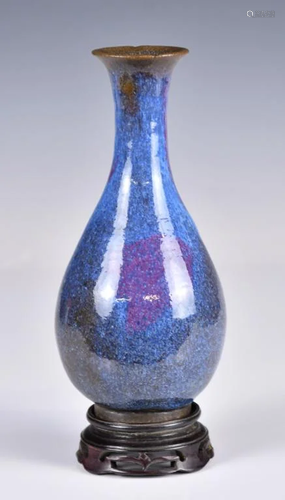 A Flambe-Glazed Vase With Stand