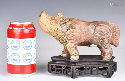 A Pottery Pig Statue with Stand