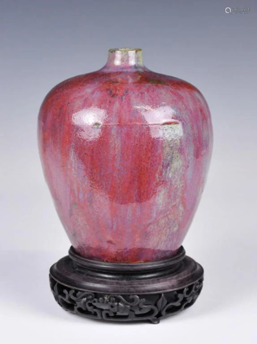 A Flambe-Glazed Vase with Stand