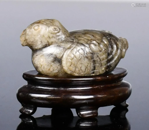 A Jade Carved Mandarin Duck with Stand