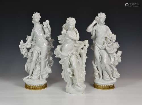 A set of three large Royal Worcester figures from The Four S...