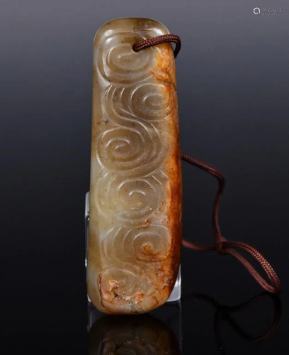 A Celadon Jade Carving