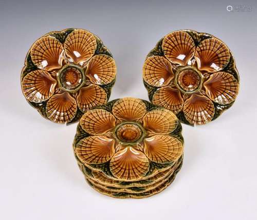 A set of six French Sarreguemines Majolica oyster plates rel...