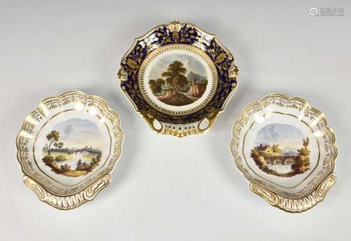 A pair of Spode shell shaped topographical dessert dishes on...