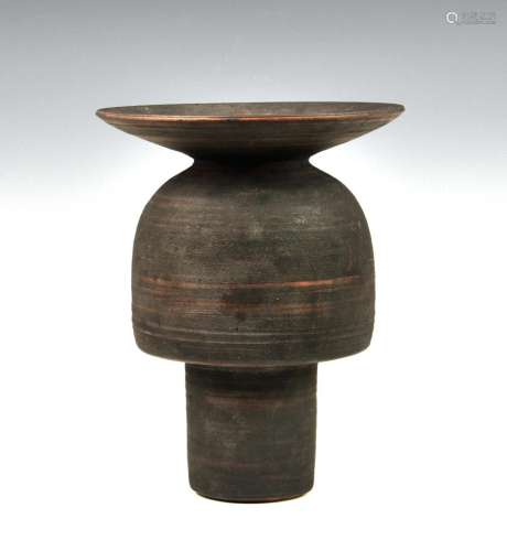 A stoneware studio pottery vase in the manner of Hans Coper ...